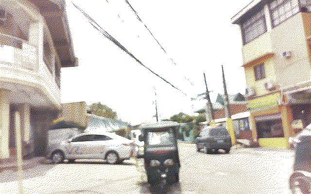 A blurry dithered photo of a scooter