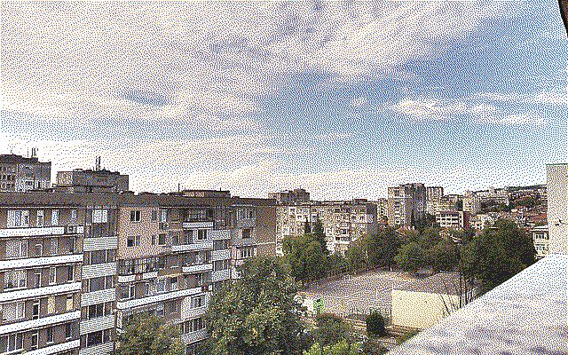 A view of a school playground and apartment blocks