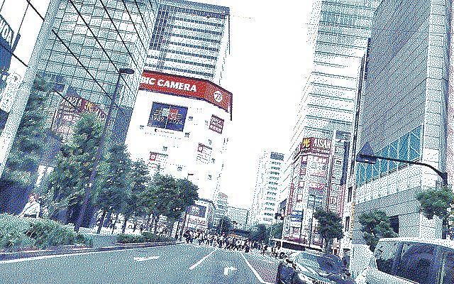 A bright photo of a pedestrian crossing in Akihabara